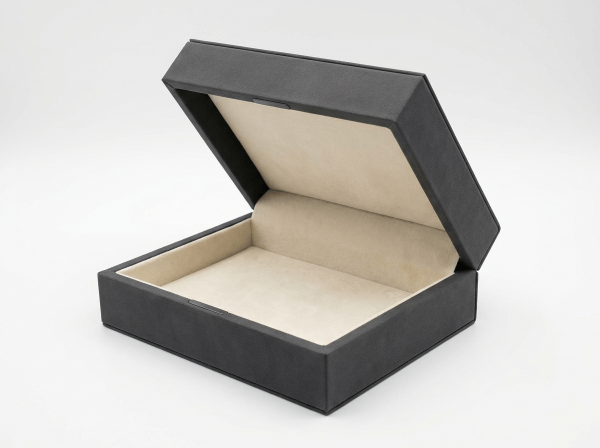 Hinged flip-lid rigid box opened at an angle