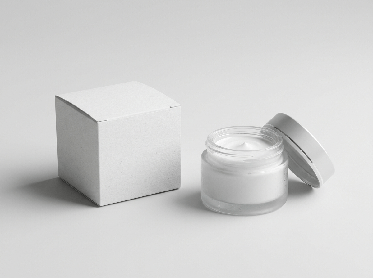 A small cosmetic carton for a face cream jar with the jar beside it